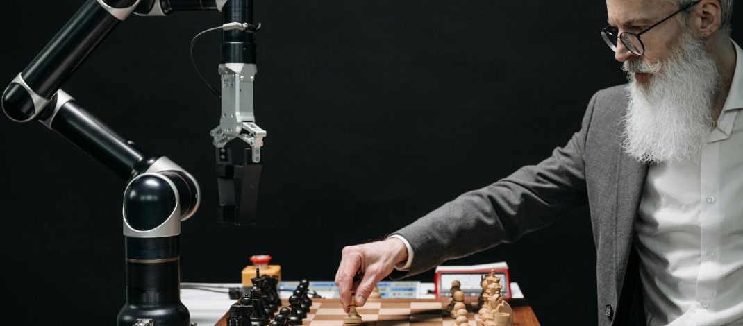 a bearded man playing chess